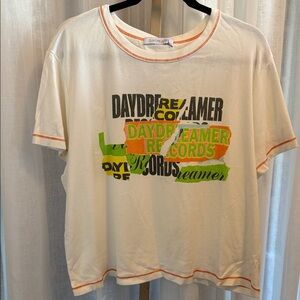 Daydreamer Cream Tee with Orange Accents